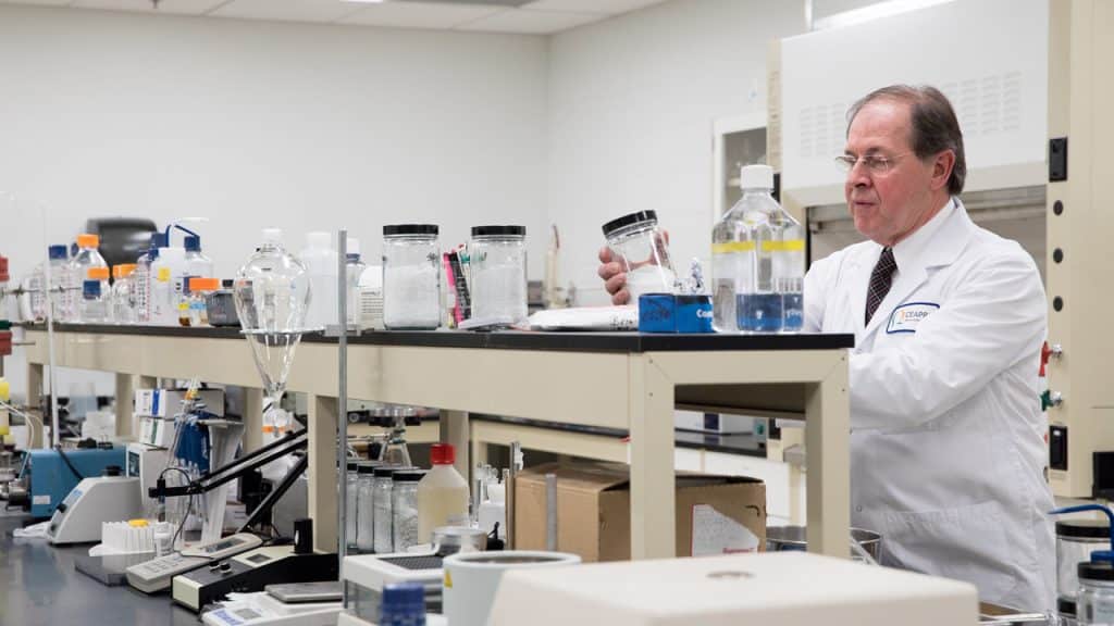 doctor of pharmacy works in a lab developing new drug patent 