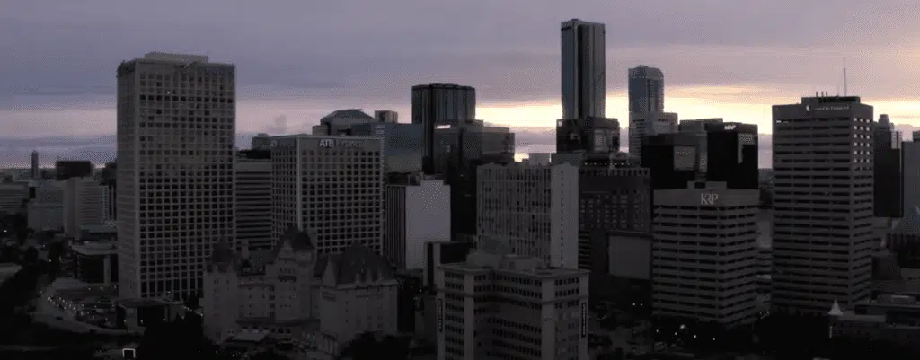 A city skyline at dusk.