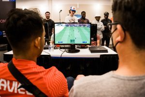 group of boys watch soccer esports game online in Edmonton
