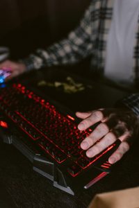 a gamer plays video game on desktop computer in Edmonton